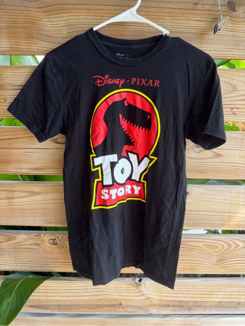 Disney Toy Story Black Tee with Red & Yellow Dino Graphic